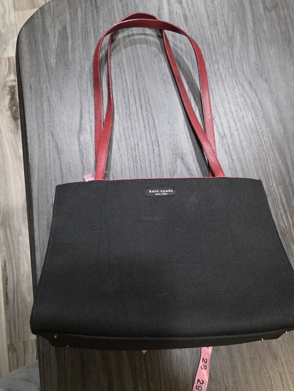 Kate Spade Black Canvas Tote with Red Straps Missing Bottom Bolts Inside Spill